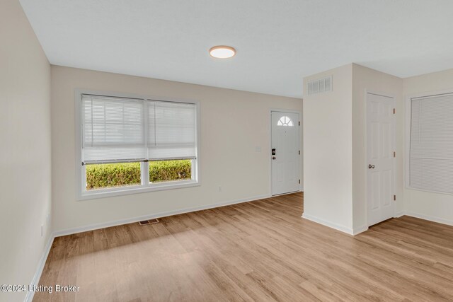 empty room featuring light hardwood / wood-style floors