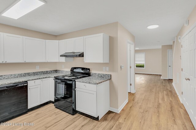 kitchen featuring black appliances, light hardwood / wood-style flooring, light stone countertops, and white cabinets