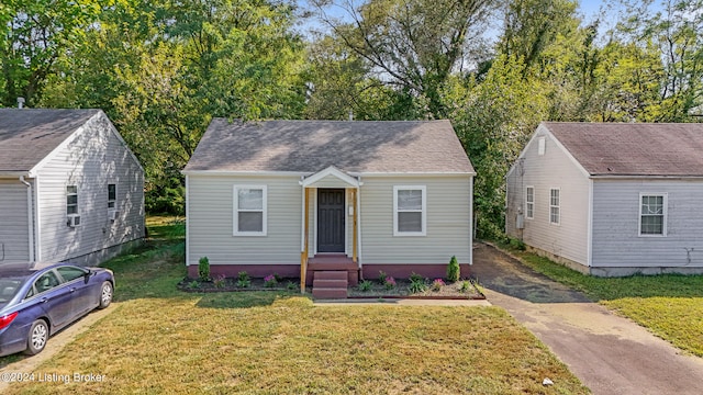 bungalow with a front yard