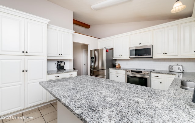 kitchen with stainless steel appliances, decorative backsplash, light tile patterned flooring, and vaulted ceiling with beams