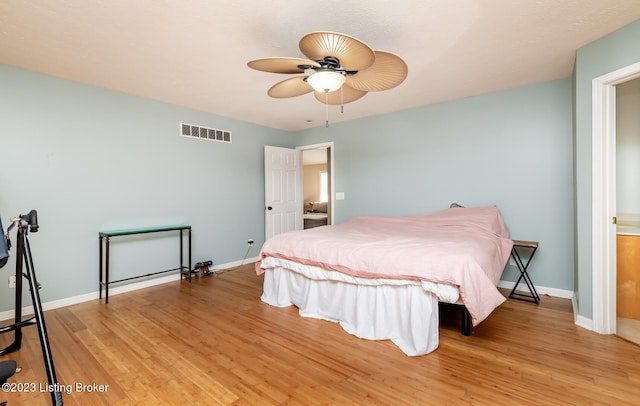 bedroom featuring ceiling fan and light hardwood / wood-style floors