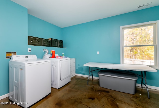 laundry area featuring washing machine and dryer