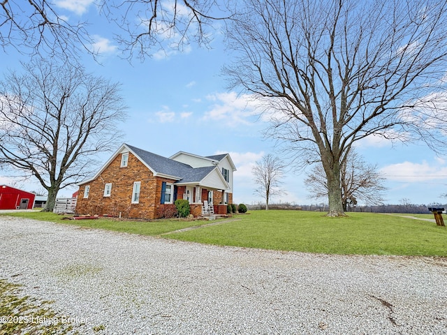 view of home's exterior with a lawn