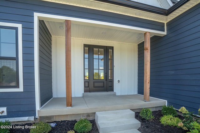 property entrance featuring covered porch