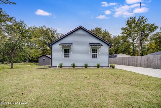 exterior space with a lawn