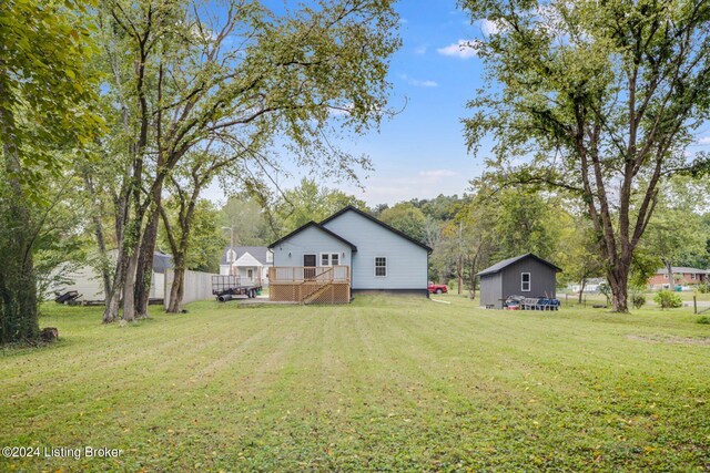 view of yard featuring a wooden deck