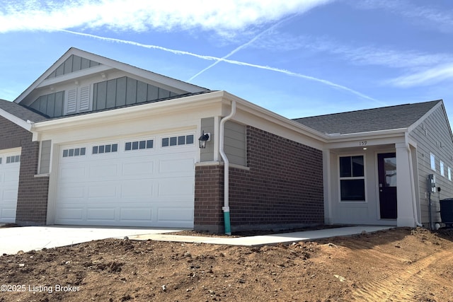 135 Switchgrass Ln Unit 68B, Mt Washington, KY 40047 - ranch-style home with brick siding, a garage, board and batten siding, roof with shingles, and concrete driveway