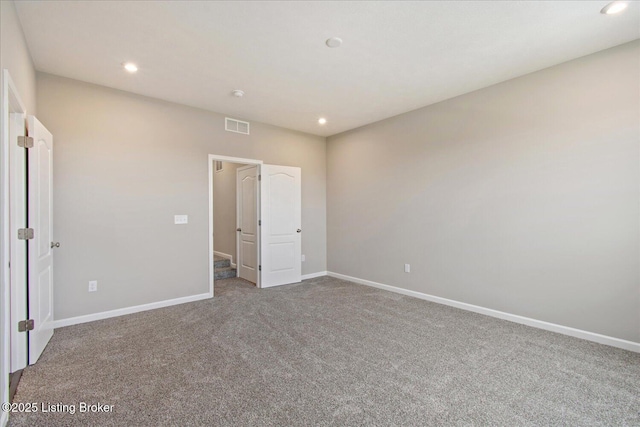 unfurnished bedroom featuring carpet flooring, recessed lighting, and baseboards
