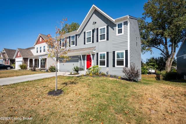 view of front of home featuring a garage and a front lawn