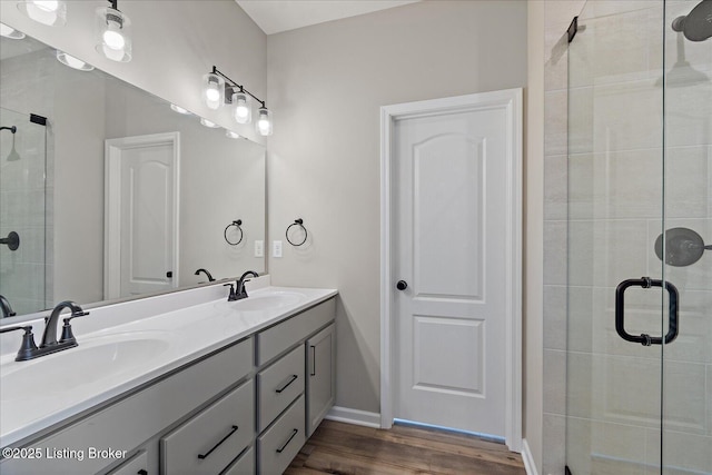 162 Harvest Point Way, Mt Washington, KY 40047 - bathroom featuring a shower stall, wood finished floors, and double vanity