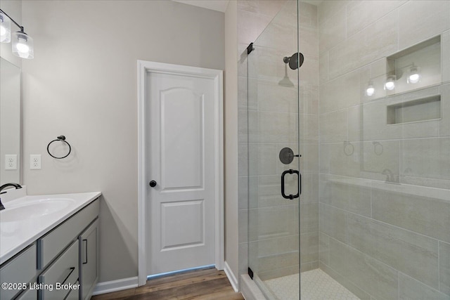 162 Harvest Point Way, Mt Washington, KY 40047 - bathroom with a shower stall, vanity, wood finished floors, and baseboards