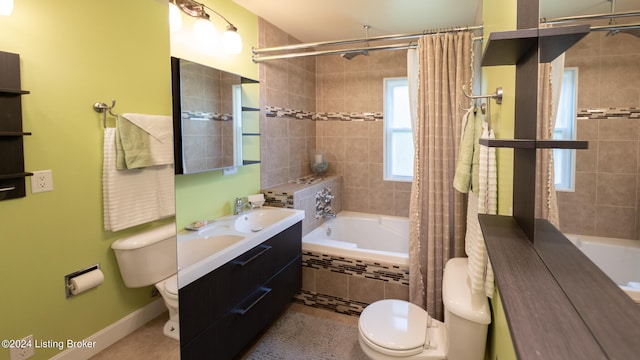 full bathroom featuring vanity, toilet, shower / tub combo with curtain, and tile patterned floors