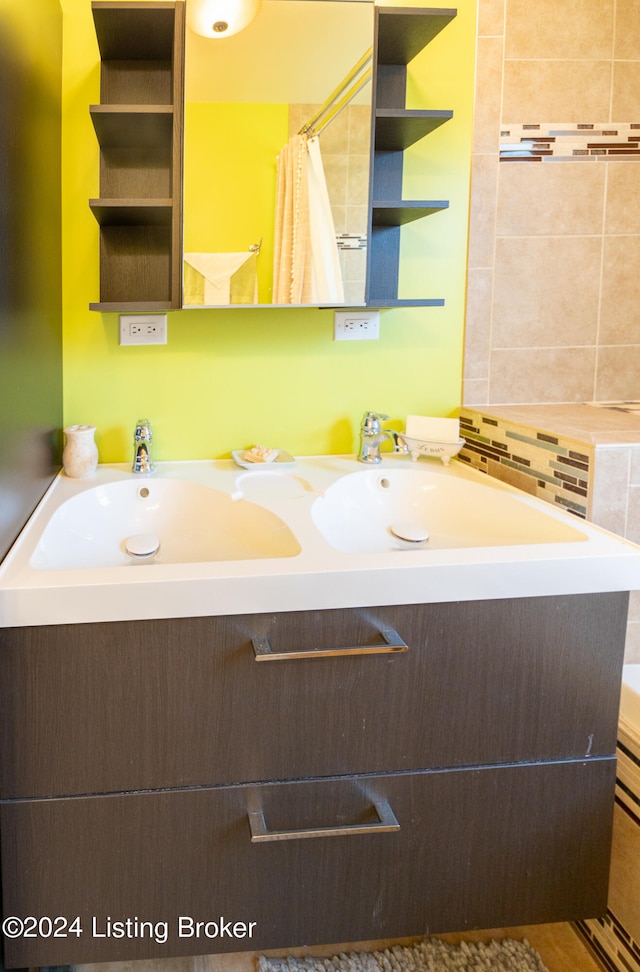 bathroom with vanity and a shower with curtain