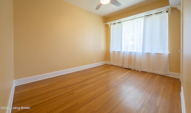 unfurnished room featuring wood-type flooring and ceiling fan