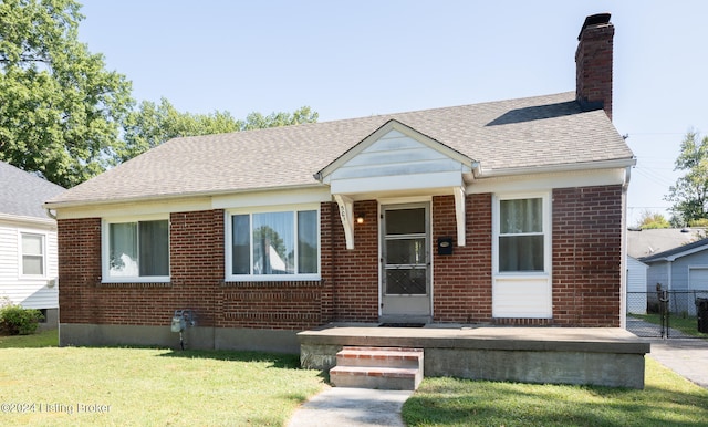 bungalow with a front yard