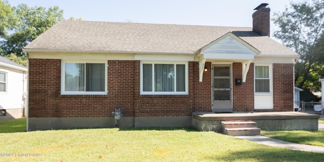 bungalow with a front lawn