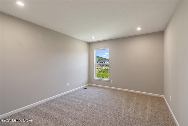 196 Harvest Moon Ct Unit 219A, Shepherdsville, KY 40165 - spare room featuring baseboards, carpet flooring, and recessed lighting