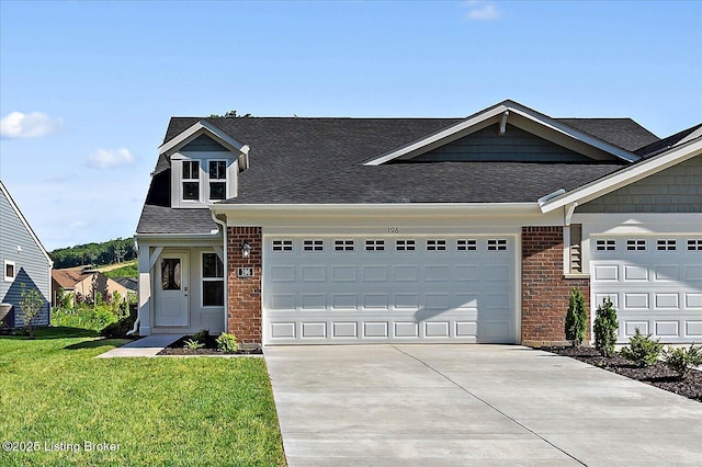 196 Harvest Moon Ct Unit 219A, Shepherdsville, KY 40165 - view of front of property with concrete driveway, a front yard, a shingled roof, and brick siding