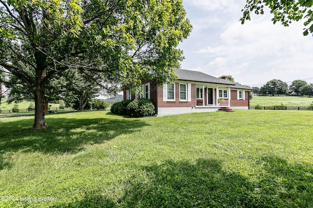 exterior space featuring a front lawn