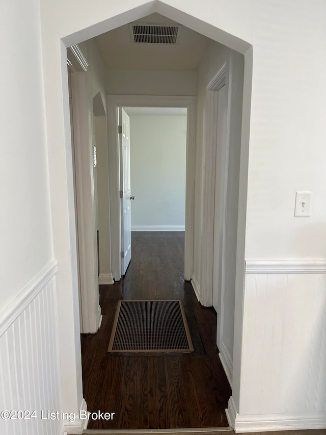 hallway featuring dark hardwood / wood-style floors