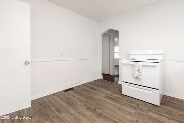 kitchen featuring hardwood / wood-style flooring and white electric range