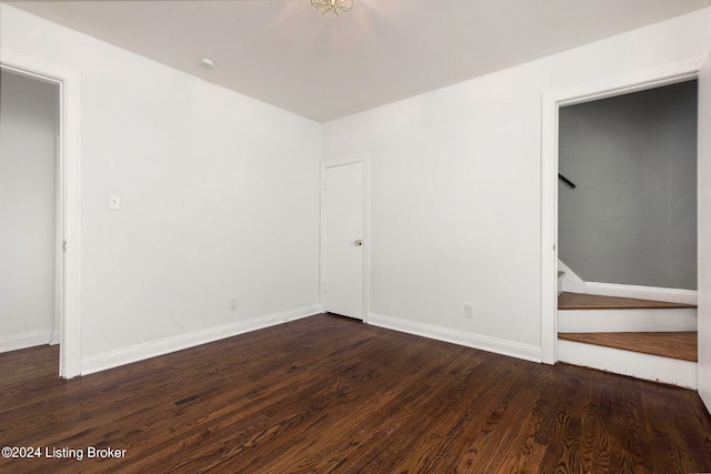 empty room featuring dark hardwood / wood-style floors