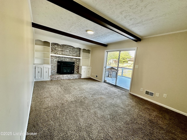 unfurnished living room featuring a textured ceiling, visible vents, baseboards, beam ceiling, and carpet