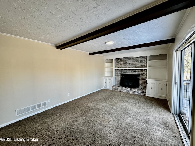 unfurnished living room featuring visible vents, a textured ceiling, carpet flooring, a fireplace, and beam ceiling