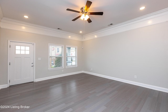 foyer entrance featuring crown molding, ceiling fan, and dark hardwood / wood-style floors