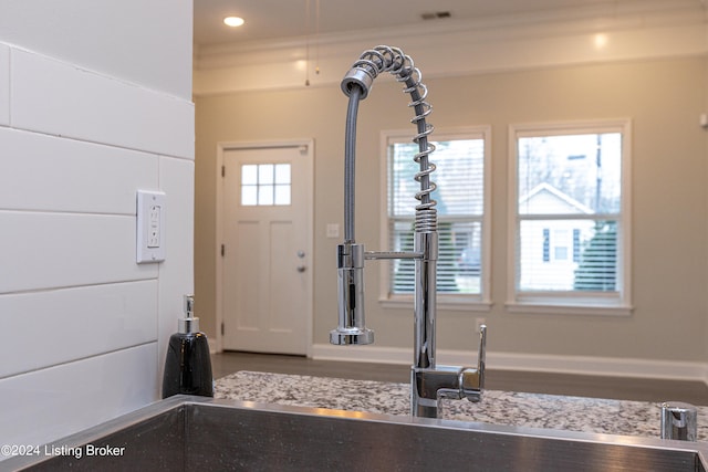 entryway with a healthy amount of sunlight and sink