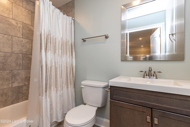 full bathroom with vanity, toilet, and shower / tub combo