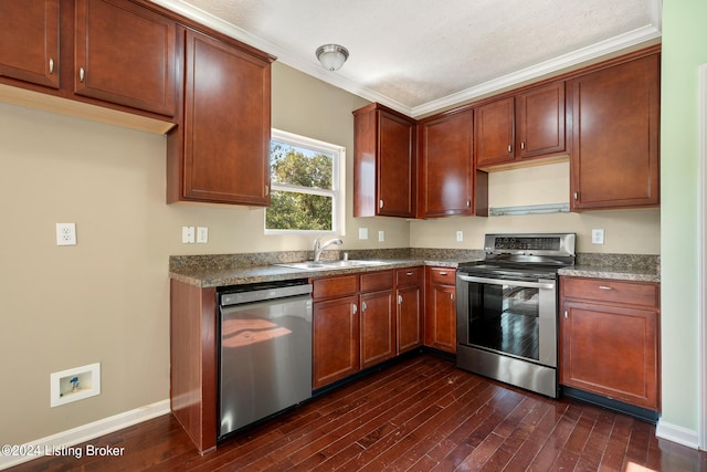 kitchen featuring dark wood-type flooring, stone counters, sink, ornamental molding, and stainless steel appliances