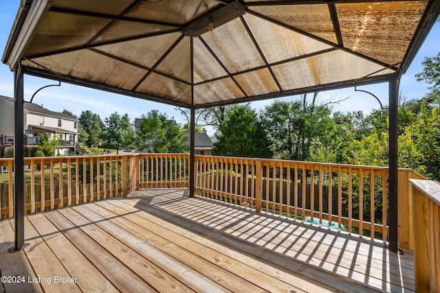 wooden terrace with a gazebo