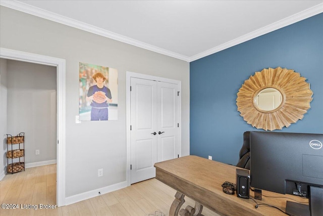 office space with light wood-type flooring and crown molding