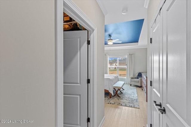 hall with light hardwood / wood-style flooring