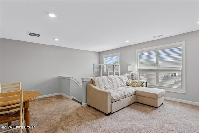 living room with light carpet