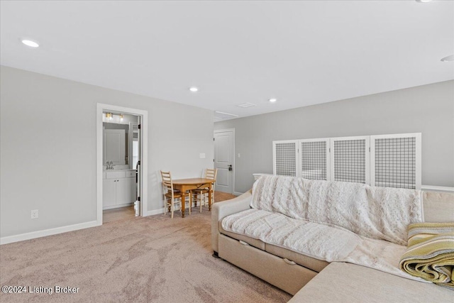 living room with light colored carpet