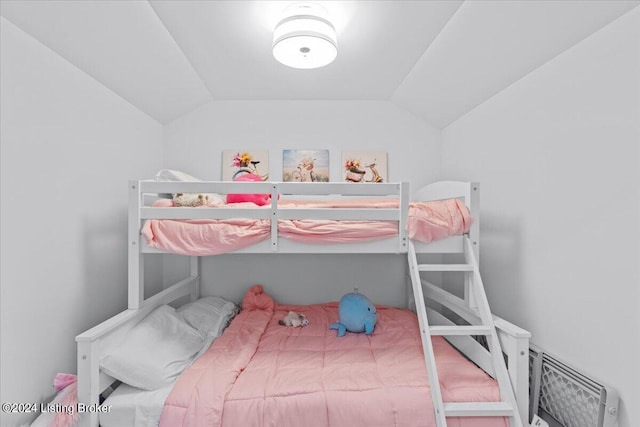 bedroom with vaulted ceiling