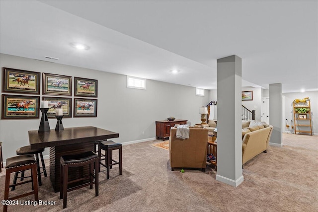 view of carpeted dining area