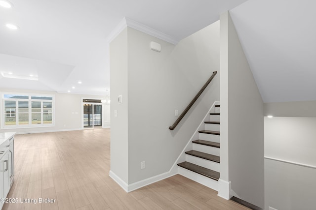 stairs with hardwood / wood-style flooring