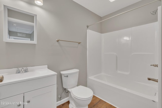 full bathroom featuring vanity, toilet, shower / tub combination, and hardwood / wood-style flooring