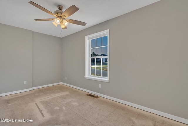 spare room featuring ceiling fan