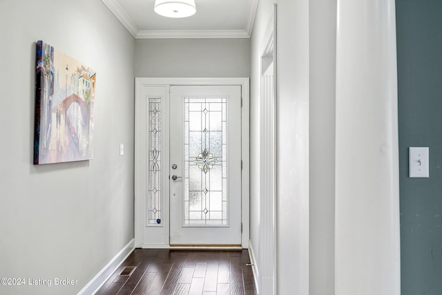 entrance foyer with ornamental molding and dark wood-type flooring