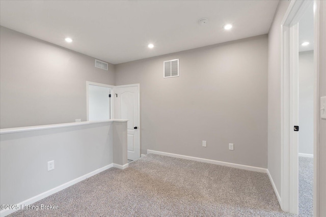 unfurnished room featuring carpet flooring, recessed lighting, and baseboards