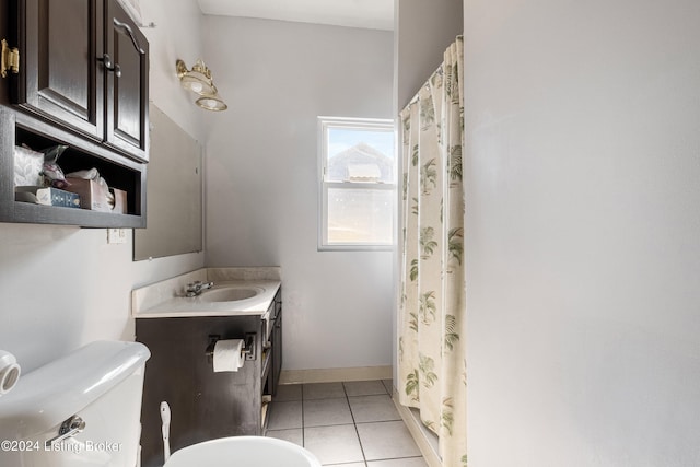 bathroom featuring tile patterned flooring, vanity, toilet, and a shower with curtain