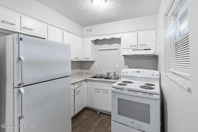1710 Liberty Bell Way, Louisville, KY 40215 - kitchen featuring white appliances, under cabinet range hood, a textured ceiling, dark wood-type flooring, and white cabinets