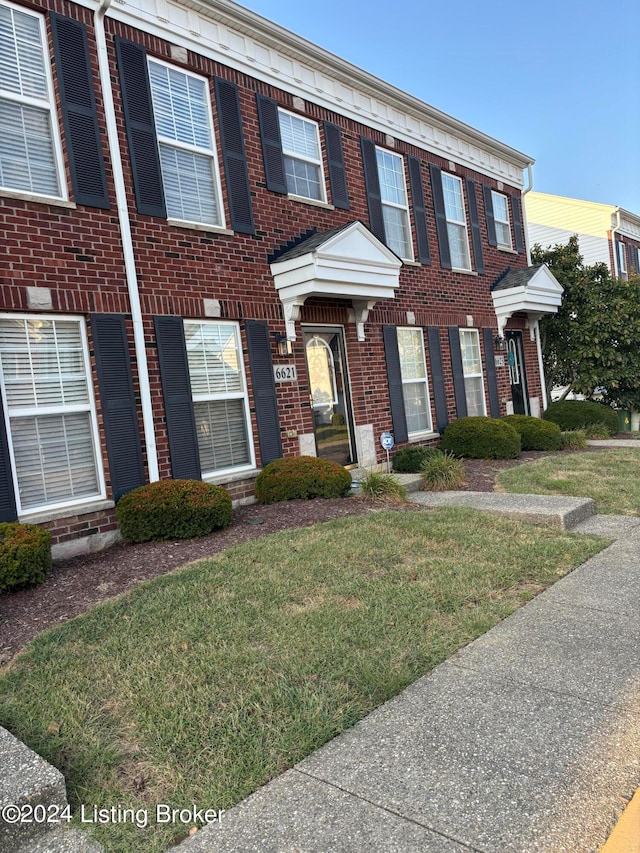 view of property with a front yard