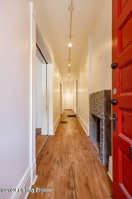 hallway featuring light wood-type flooring