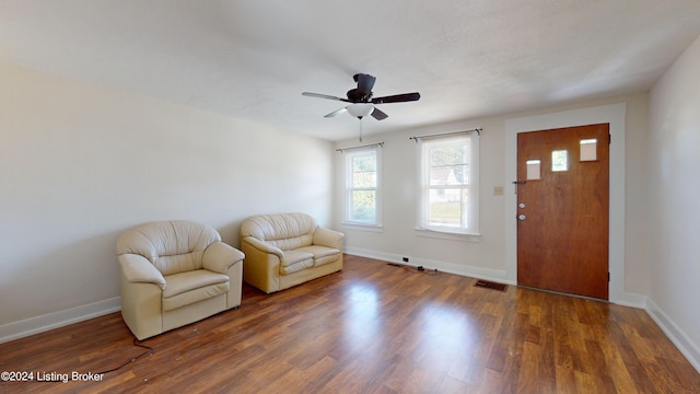 unfurnished room featuring dark hardwood / wood-style floors and ceiling fan