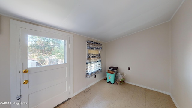 entryway featuring vaulted ceiling